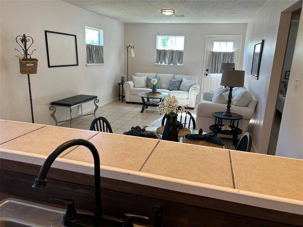 Kitchen opens to Living Room