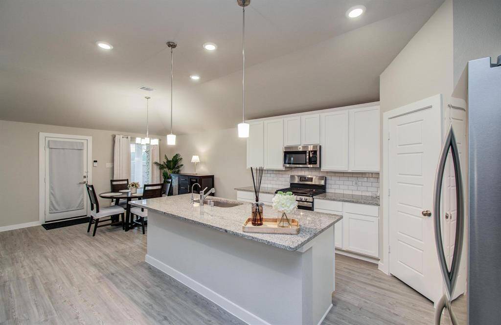 Kitchen opens to family area. Perfect for entertaining.