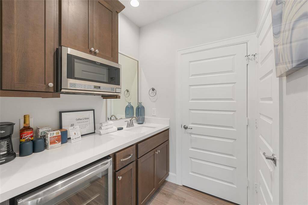 *Not photo of actual home.  Photos are of current Model Home with same floor plan.  Kitchenette is an optional add on.  Finishes for this home will be Package 8.*