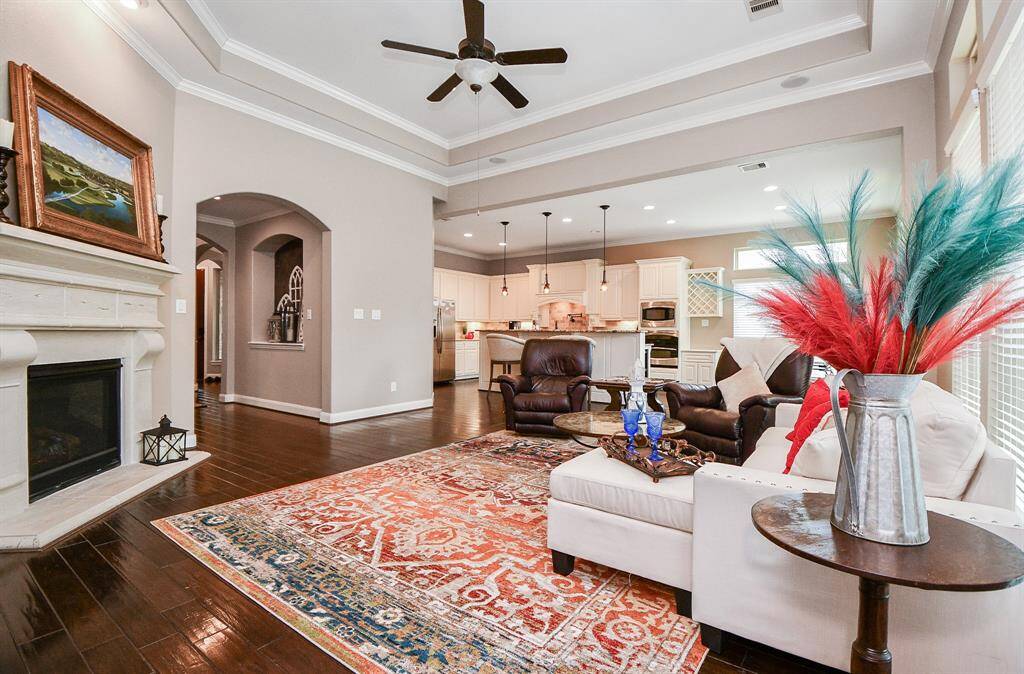 At the heart of the space, a fireplaceadds a cozy focal point, providingwarmth and charm.
