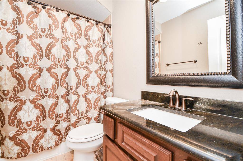 Third bathroom features atub/shower combo and vanitywith plenty of counter space.