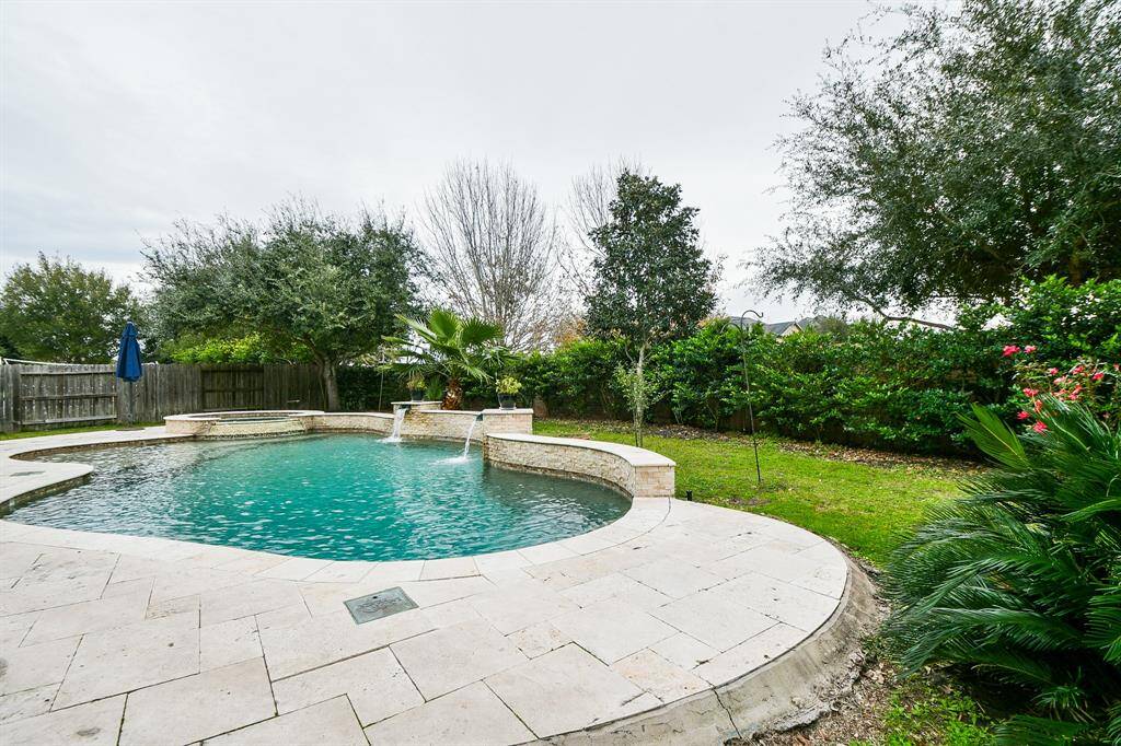 The backyard also has plenty of green space.
