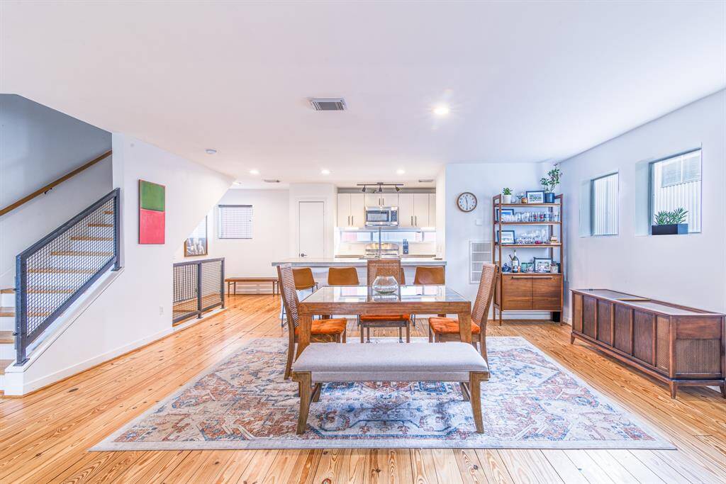 Large family room with high ceilings and skylights.