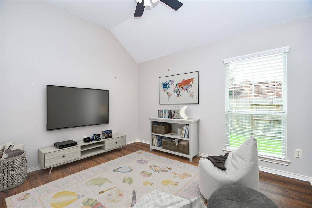 Bedroom #2 is adjacent to the first, measuring 10' x 12' also with a large window, raised ceilings, neutral paint, a ceiling fan, and sizable closet.