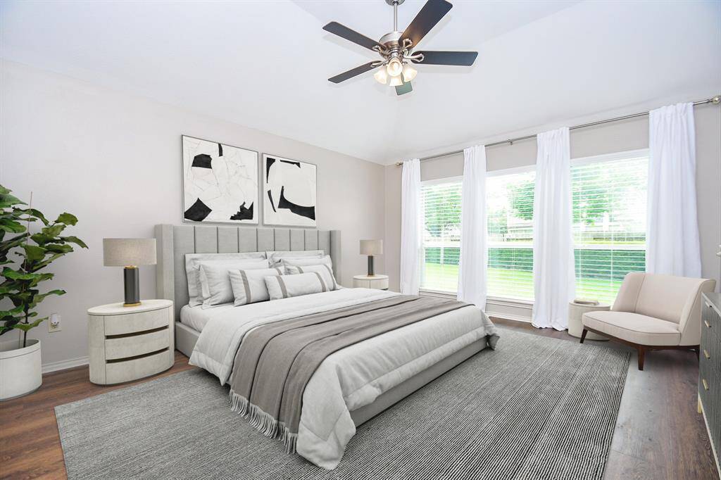 You'll have plenty of sweet dreams and restful sleep here in your new primary bedroom! Measuring 13' x 16', you'll find a wall of windows that bring in the bright and warm spring light as well as offers pristine views to your backyard.