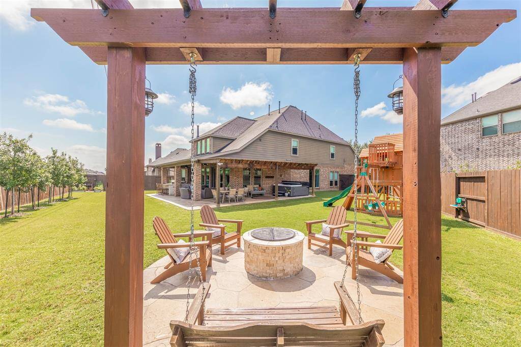 Soak and unwind in the private hot tub nestled under a wood pergola - your personal escape just steps from home.