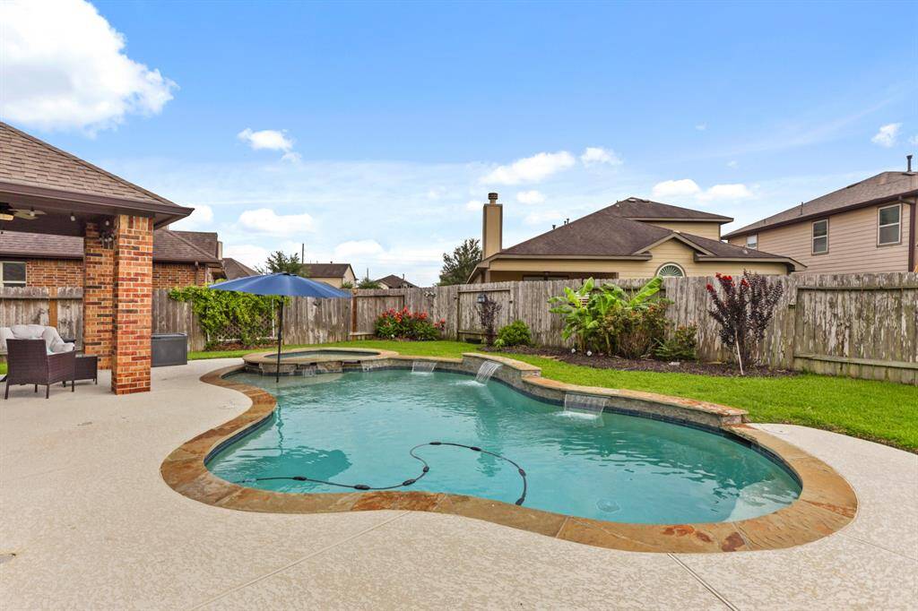 This backyard oasis is truly the perfect place to sit back and relax!