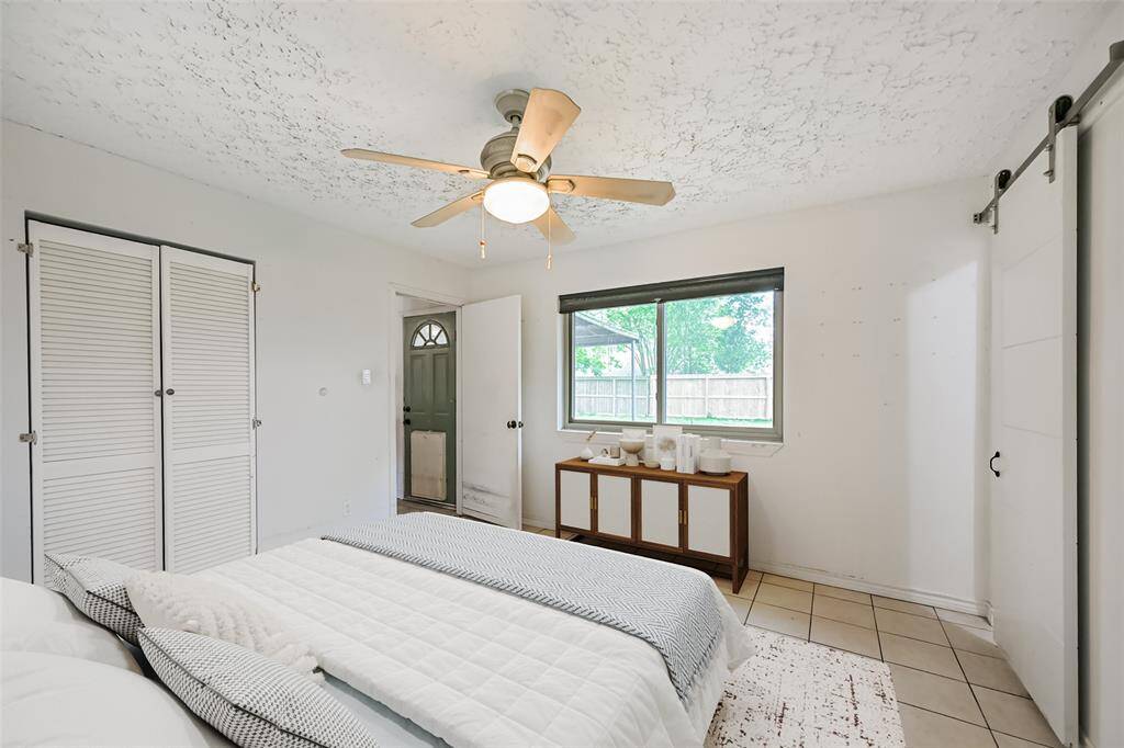 Primary bedroom offers a private en-suite bath