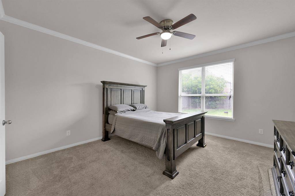 The primary bedroom is large and spacious.