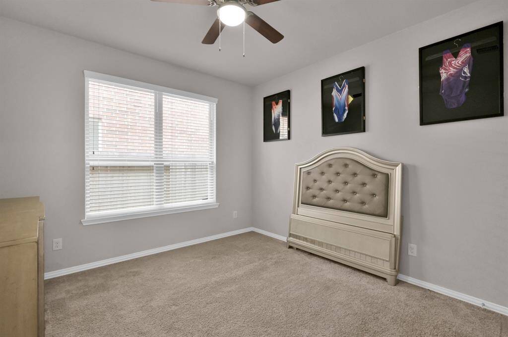 View of a spacious secondary bedroom.