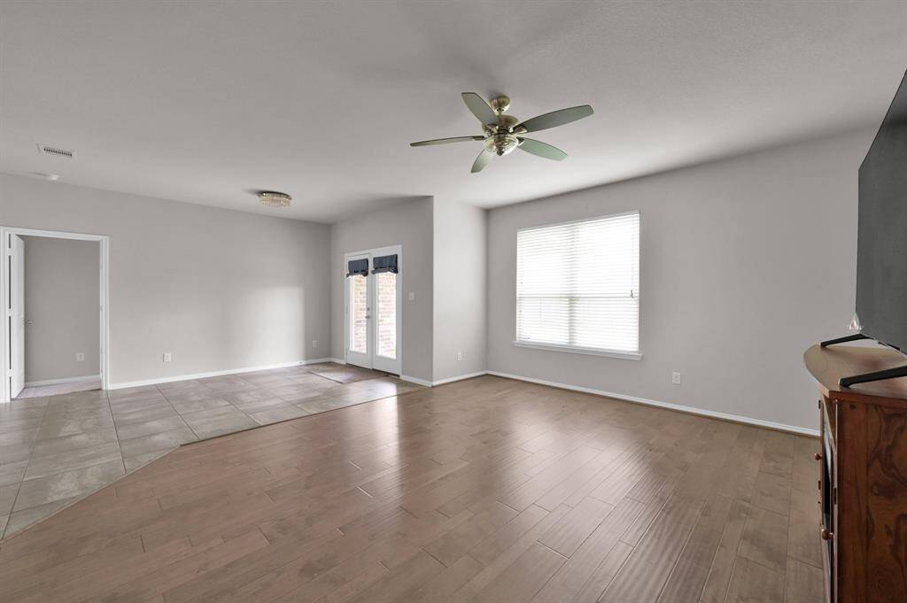 The large living room has an open concept to the dining area. This home feels bright and spacious all around.