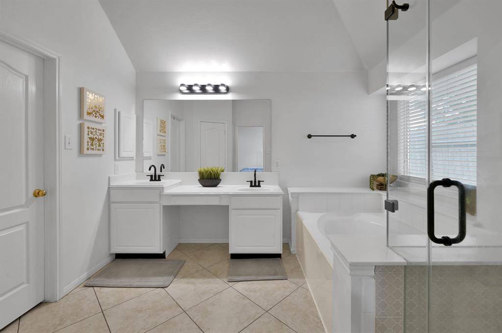 Primary bathroom. Large walk in closet to the left