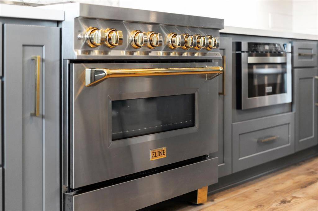 High-end kitchen appliances, including a professional-grade ZLINE gas range, offer both style and performance for the discerning home chef.