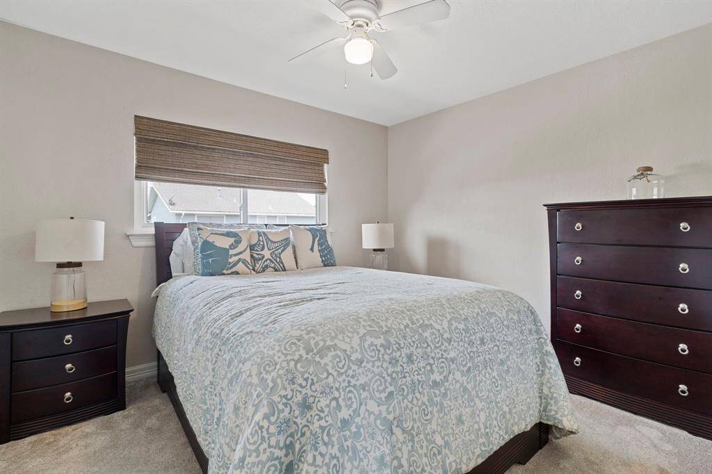 The secondary bedrooms also boast large, energy-efficient windows that invite natural light, complemented by neutral, move-in ready finishes that offer a blank canvas for personalization.