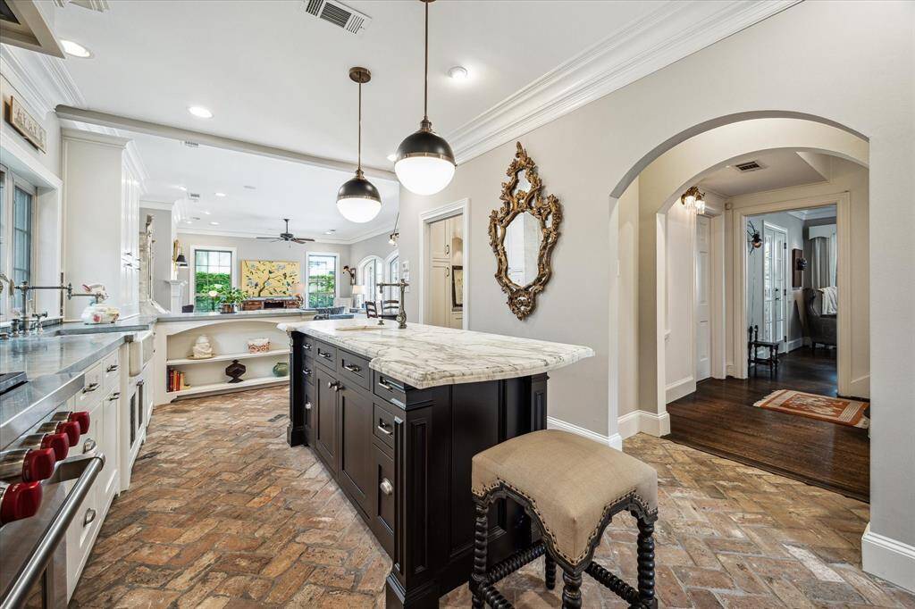A view from the kitchen towards the main hallway and family room.