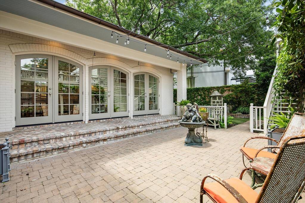This charming outdoor area offers the perfect balance of turfed green space and paved patio—ideal for entertaining, relaxing, and giving pets or kids a safe place to play.