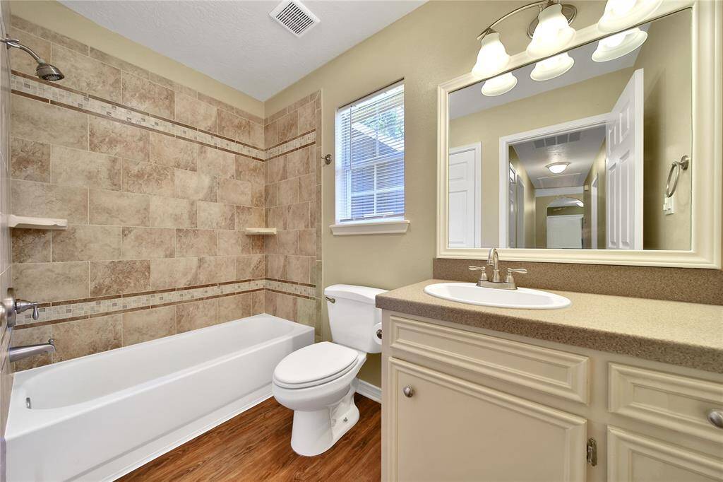 Full bathroom off end of hallway.