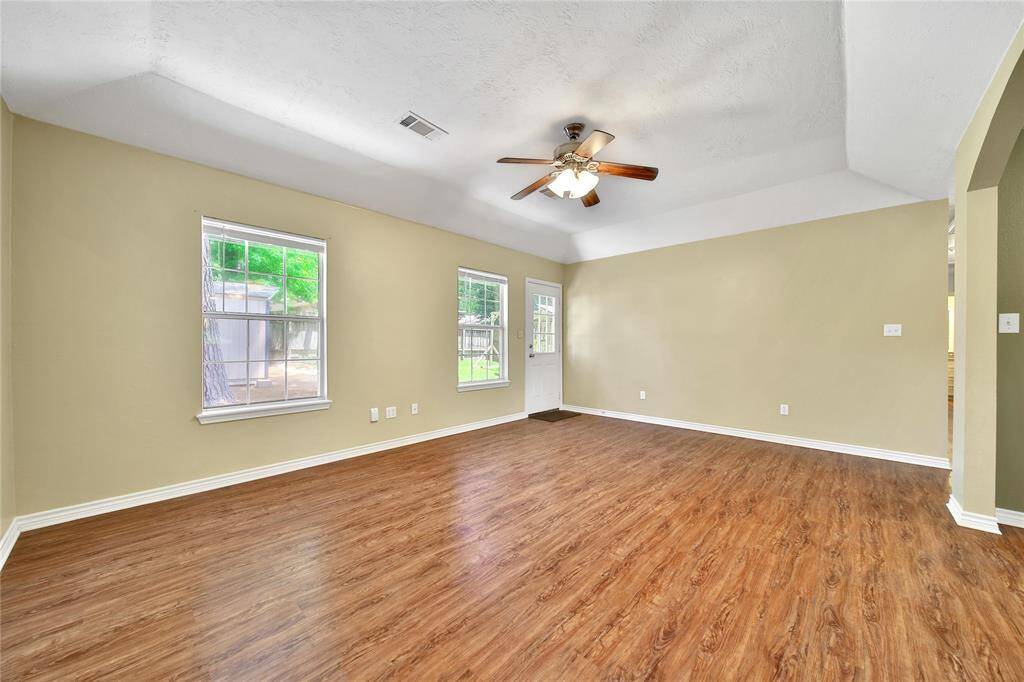 View of living room and backdoor.