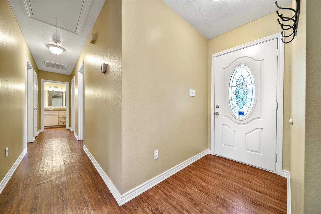 Entry into home and view of the hallway.
