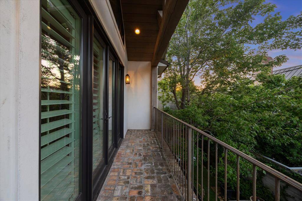 Private garden-view balcony off the primary suite—ideal for morning coffee or evening unwinding.
