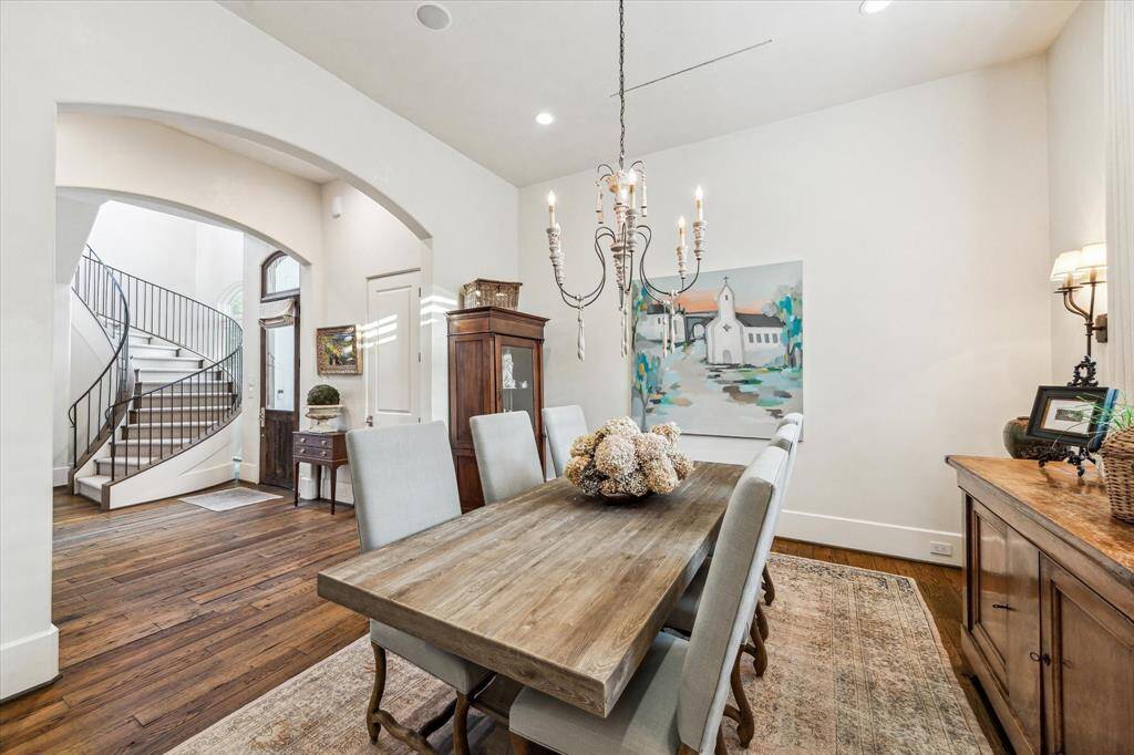 The dining room is accessible through the butler's pantry and is adjacent to the wetbar and wine room.