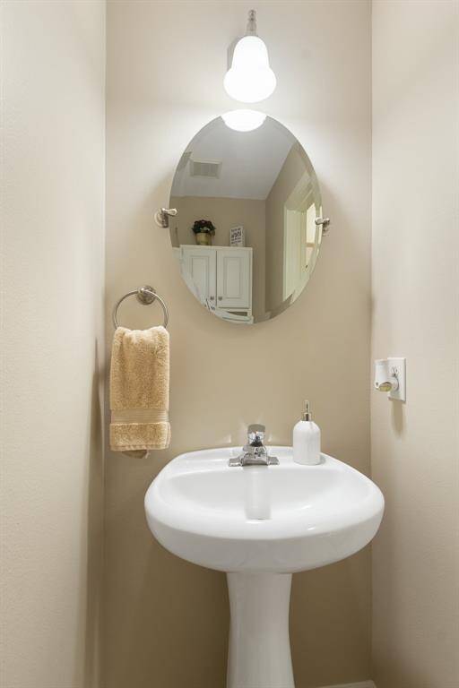 This room includes a ceiling fan, carpet and a closet. Envision a pool table gracing this room. Convient access to the second floor bathroom.
