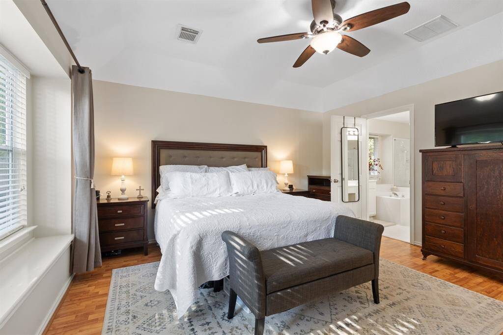 Located on the second floor, the third bedroom, presently serving as an office, includes a ceiling fan, comfortable carpeted flooring, and a nice sized closet.