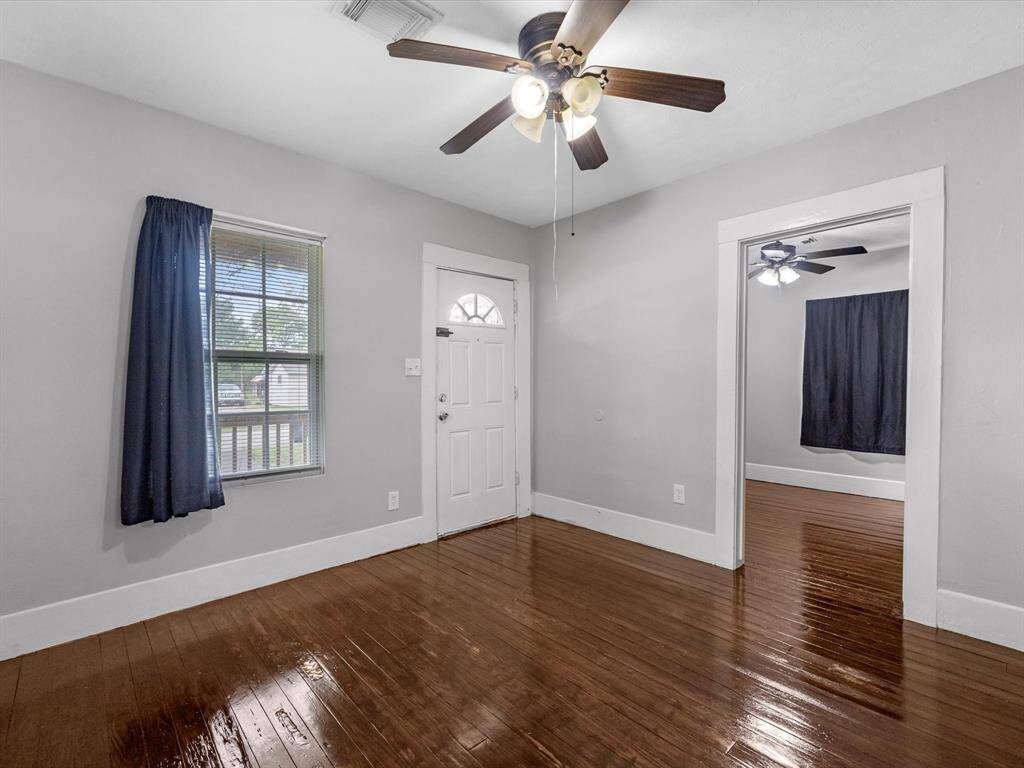Living room entrance leading to one of the bedrooms.