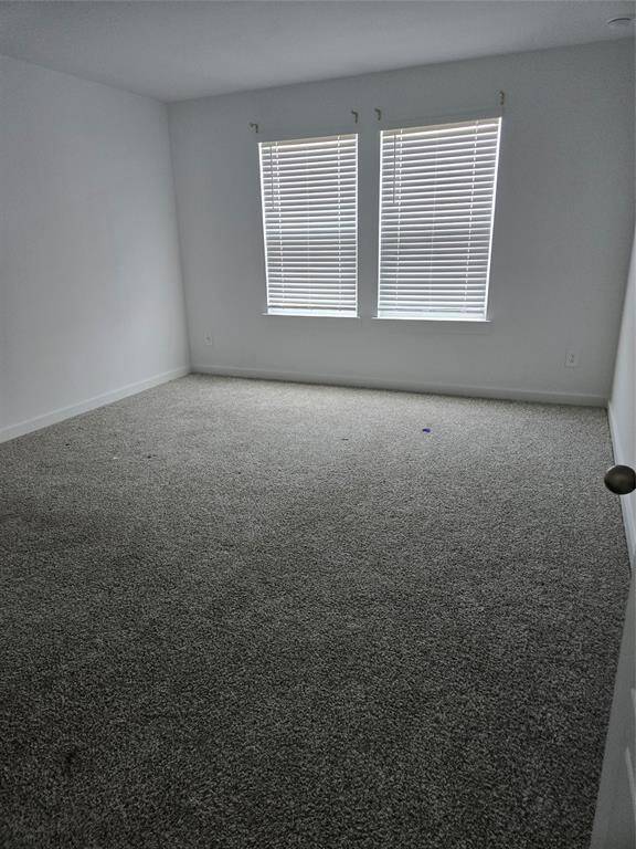 Discover a sleek two-story home in a secure gated community, ideally located near Houston's Medical Center and downtown.
