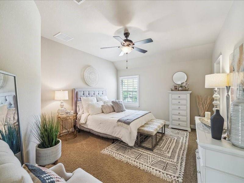All of the secondary bedrooms have large furniture.