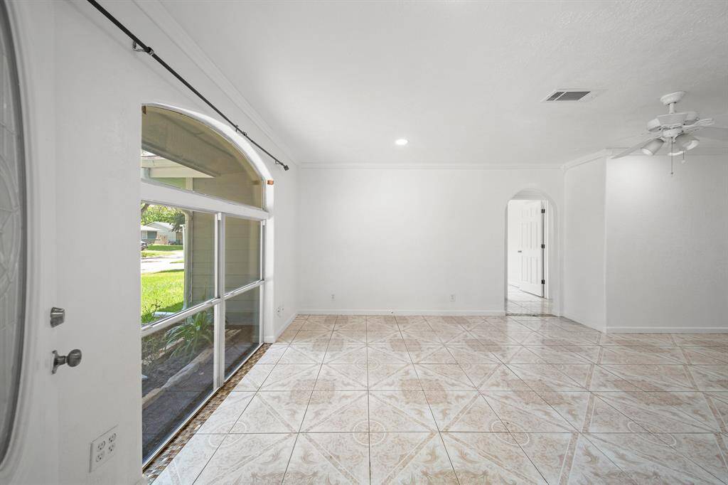 Step inside to fresh paint and tile flowing throughout the home.