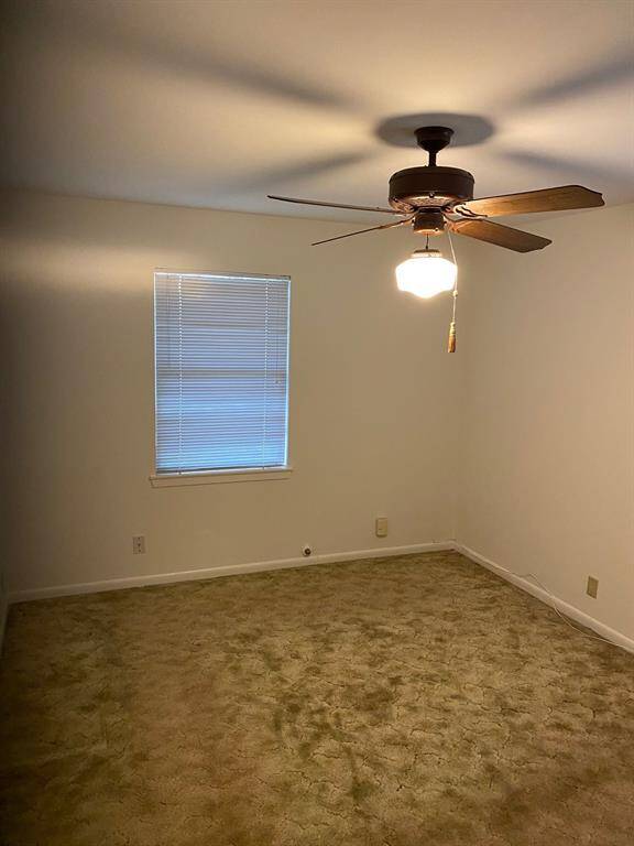 bedroom in front of house with street view
