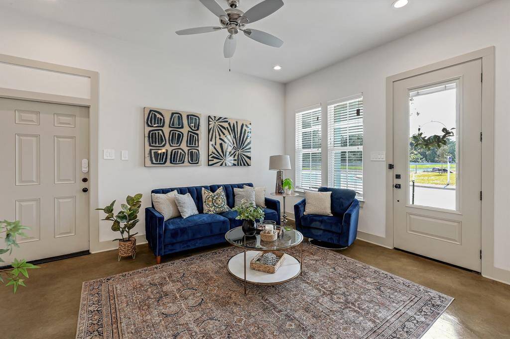 Spacious living area with plenty of natural lighting!Model Home.