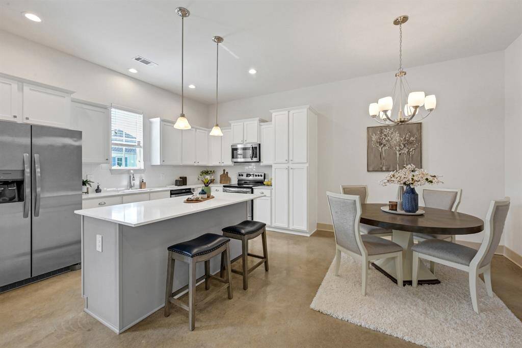 Kitchen and dining room!Model Home.