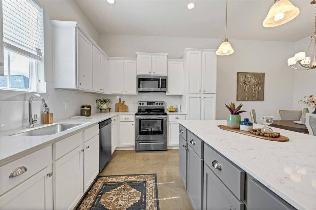 Perfect kitchen space with large island!Model Home.