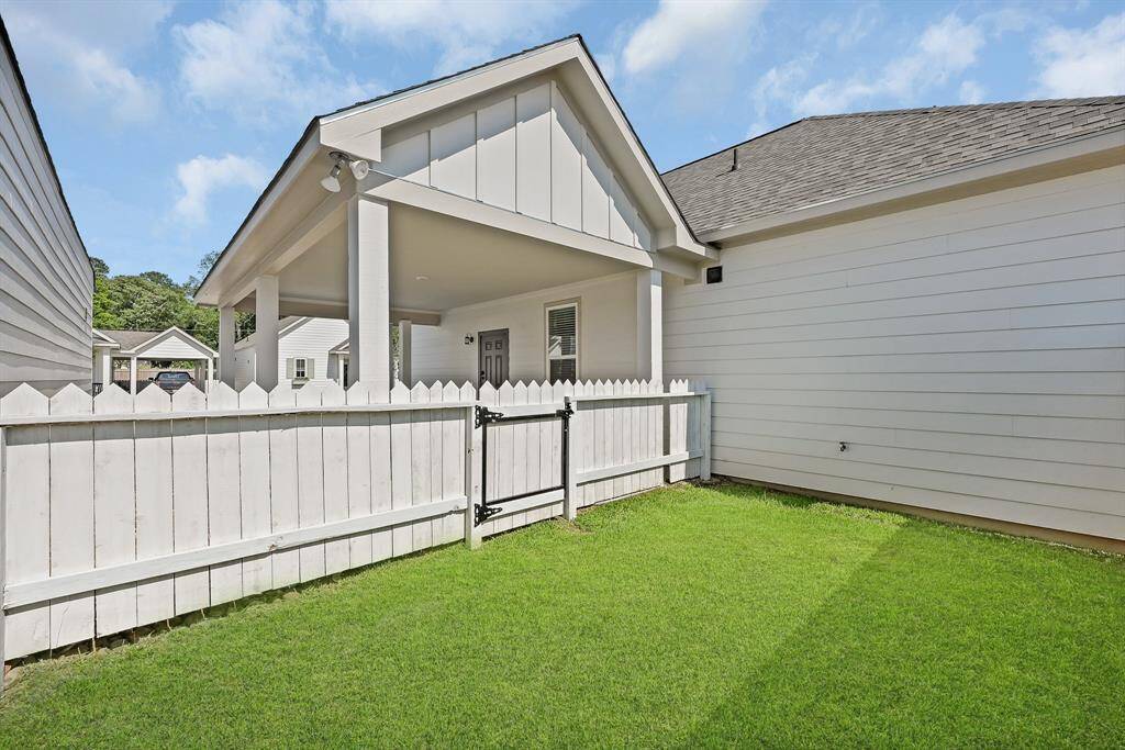 All homes offer private backyard and covered pull up driveway!Model home.