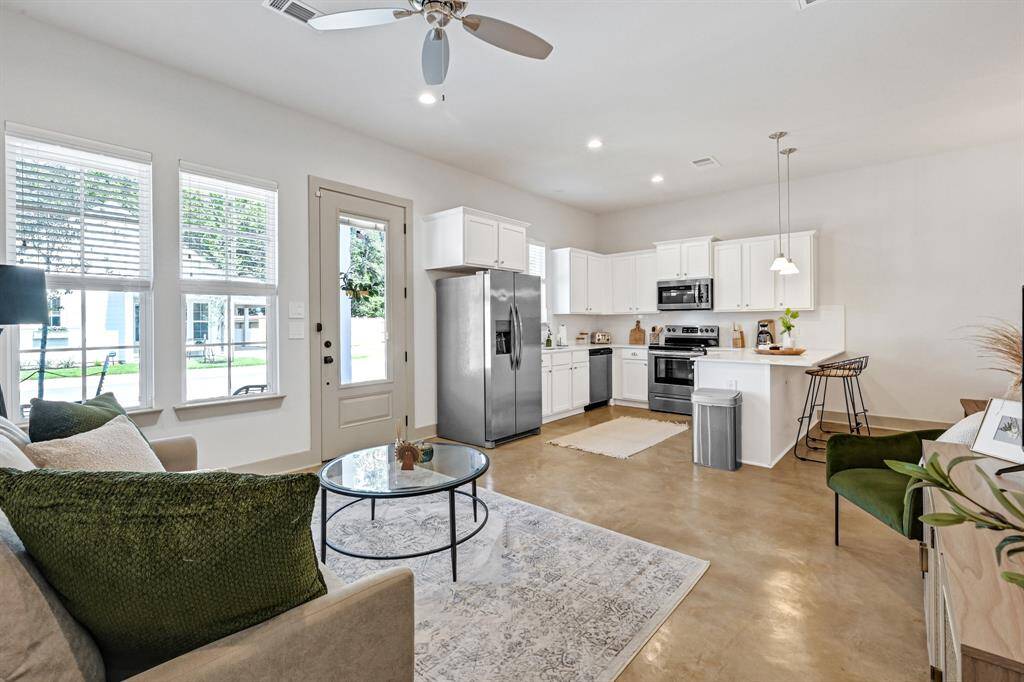 Spacious living, kitchen and dining area!Model home.
