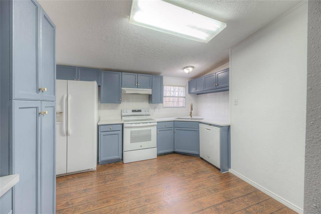 Updated Kitchen with plenty of storage.