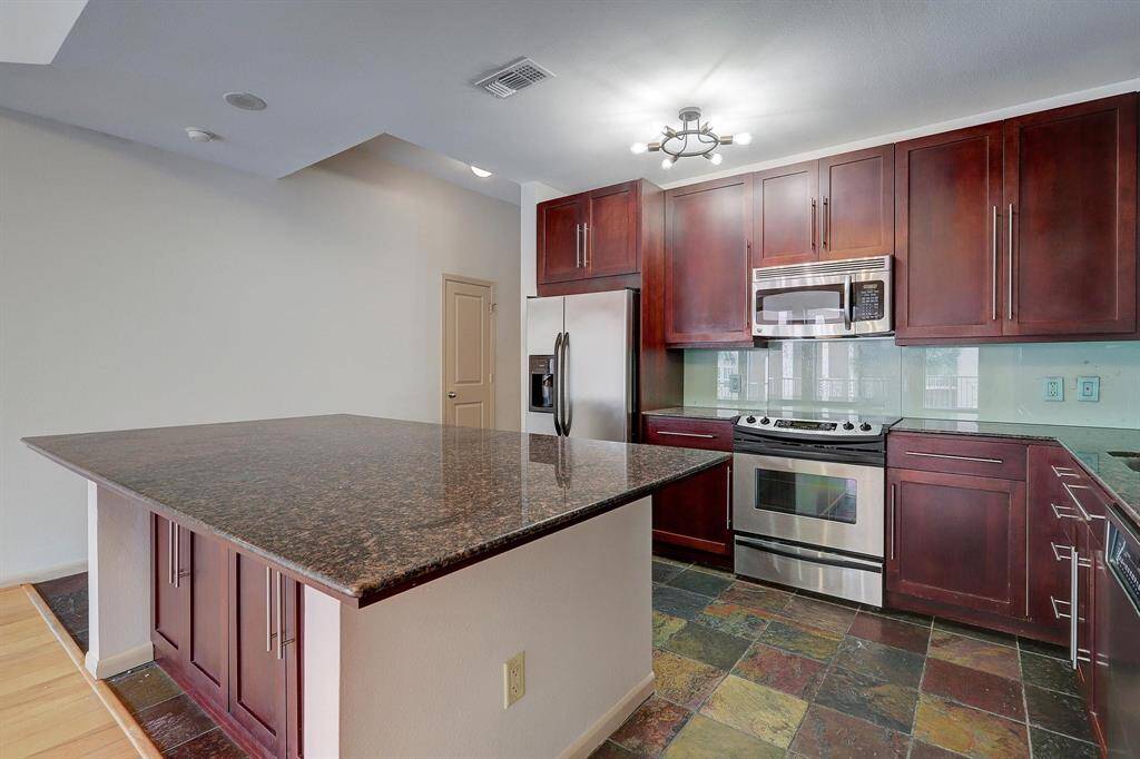Additional view of kitchen.