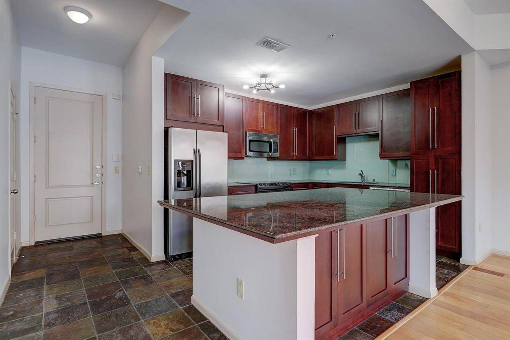 Additional view of kitchen.