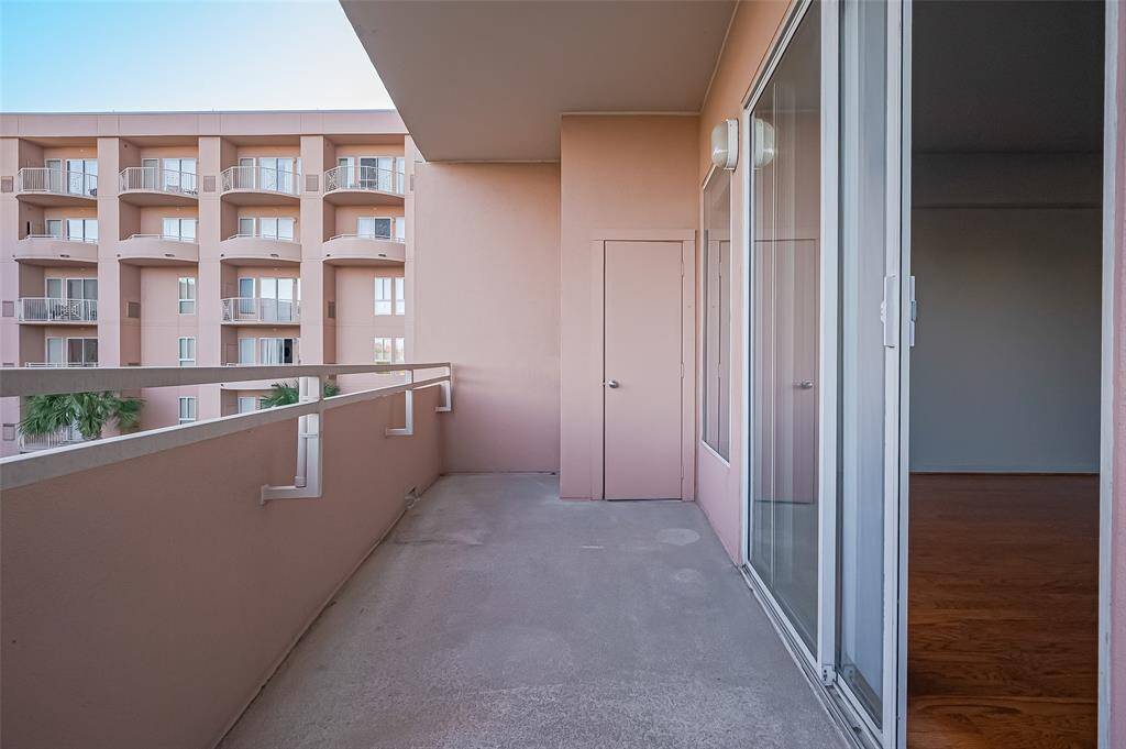Balcony views of the city and the pool. Outdoor private storage space.