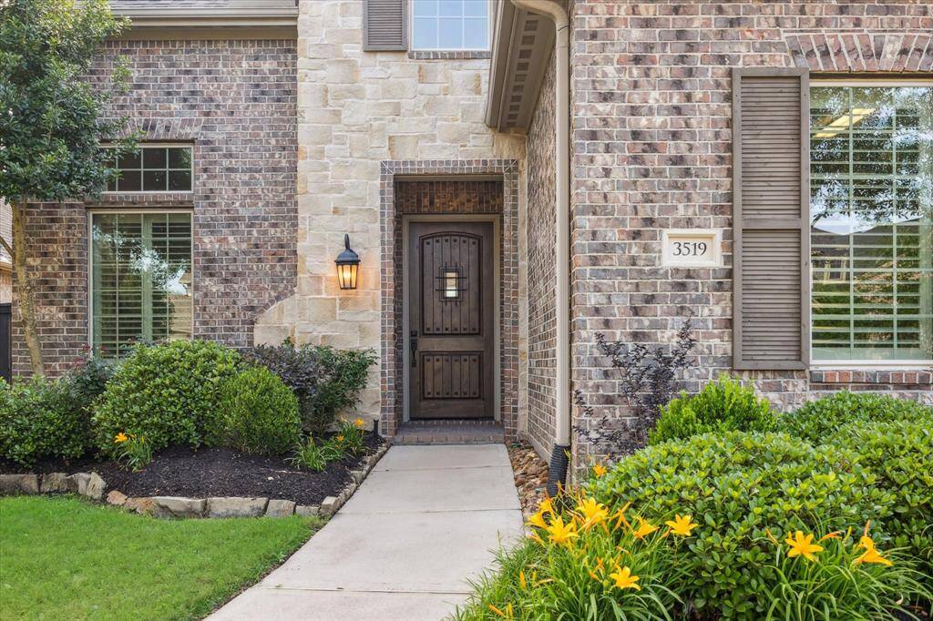 3 car garage with private entrance for the guest suite with kitchenette (2nd Primary Bedroom) perfect for multigenerational living or extended guest stays