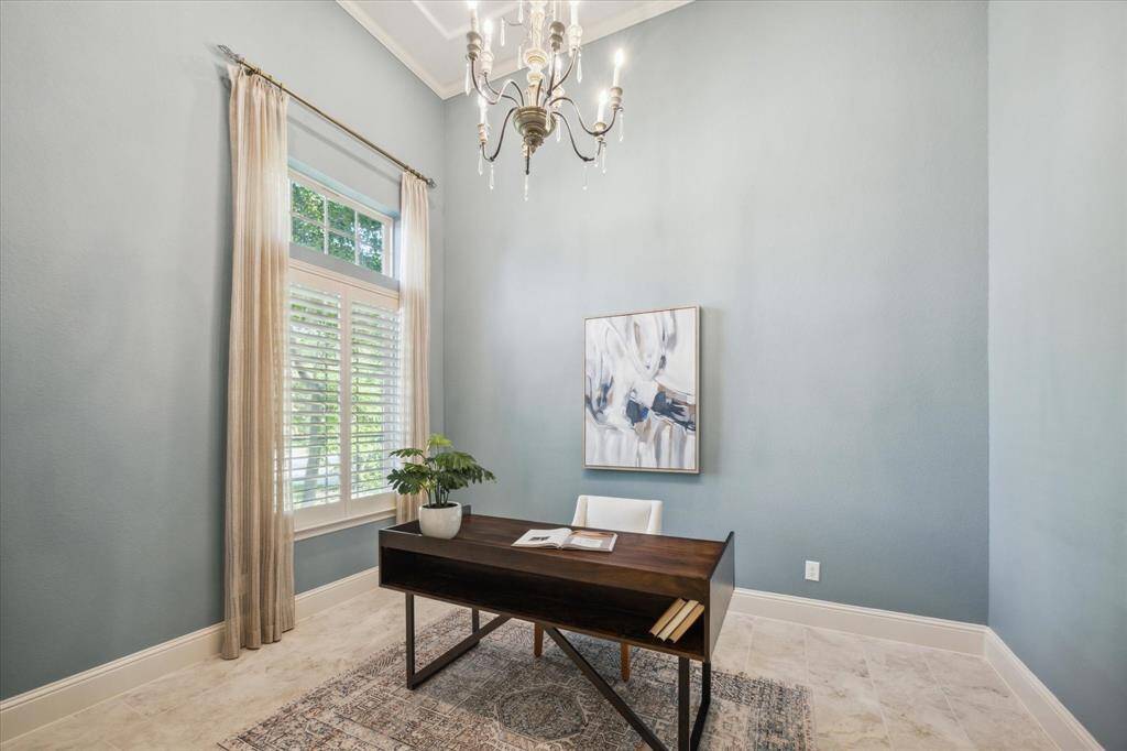 Soaring ceilings and gorgeous chandeliers greet you upon entry