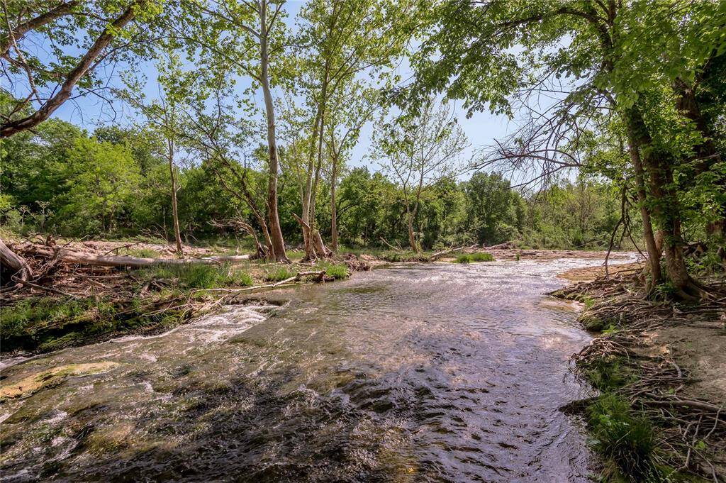 There are many falls and pools along Harmon Creek extending the east side of the property from south to north. Harmon Creek is perennial spring fed, not a dry creek.