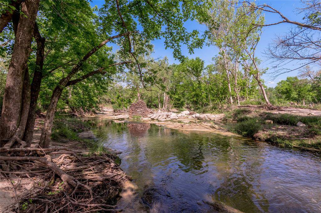 Great swimming and fishing in Harmon Creek. Beautiful clear water with the sand and limestone lined bed.
