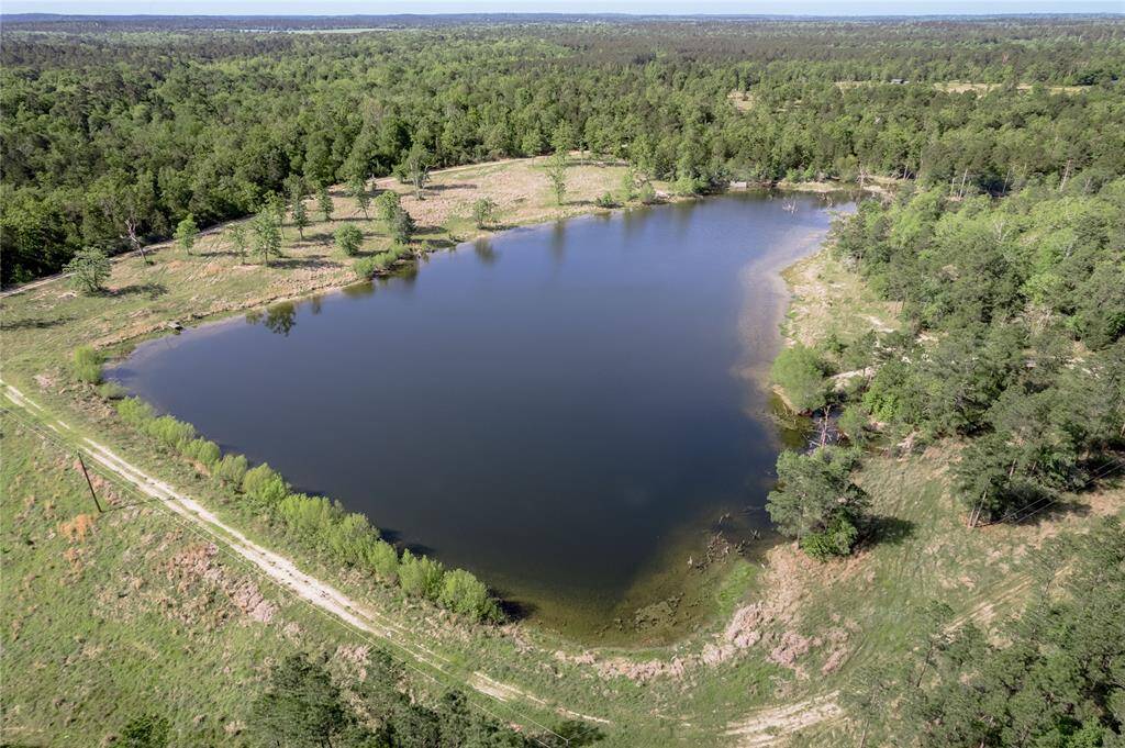 This lake was built to be 9.1 acres at the top of the dam below on the east end of the lake. This view is on the bottom of the north section looking SW.