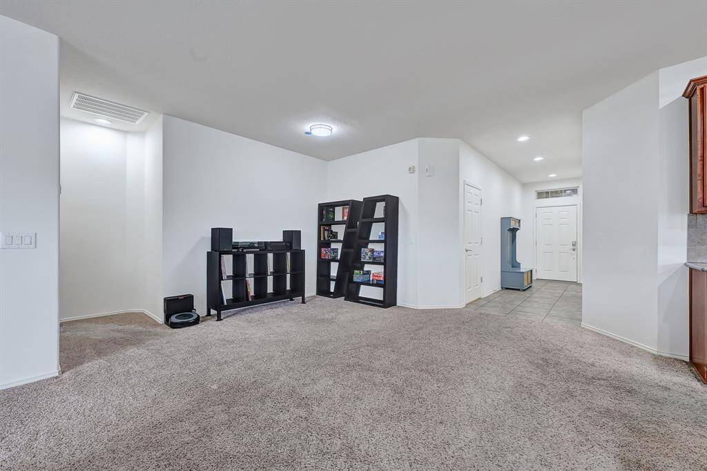 Will you use this centrally located functional space as a playroom, office, sitting or dining room? Possibilities abound!