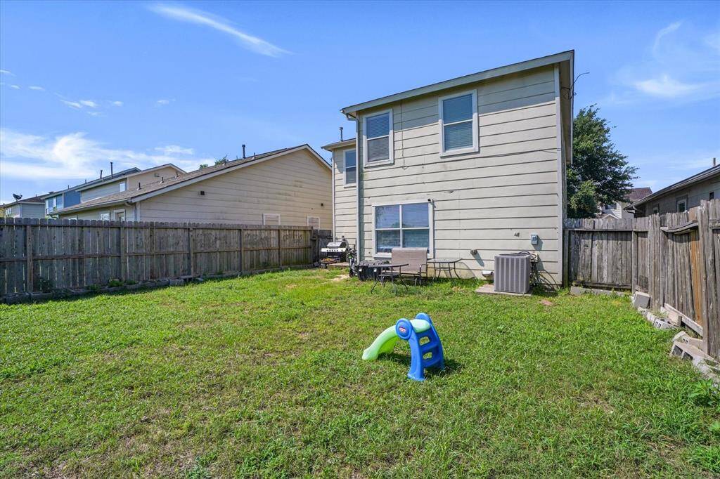 Fully fenced backyard with no rear neighbors, offering added privacy and space for pets, play, or relaxing outdoors.