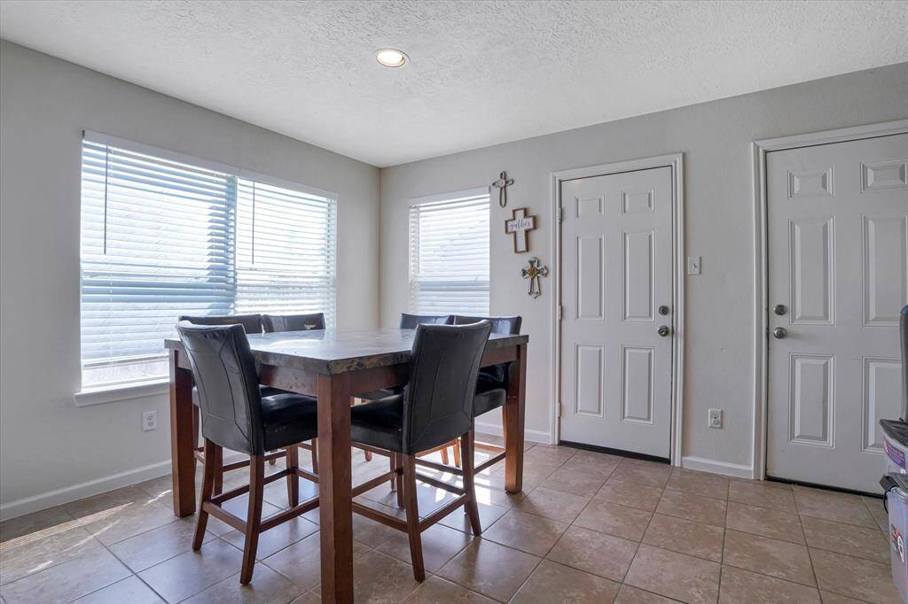 Cozy dining space just off the kitchen, ideal for family meals or casual gatherings