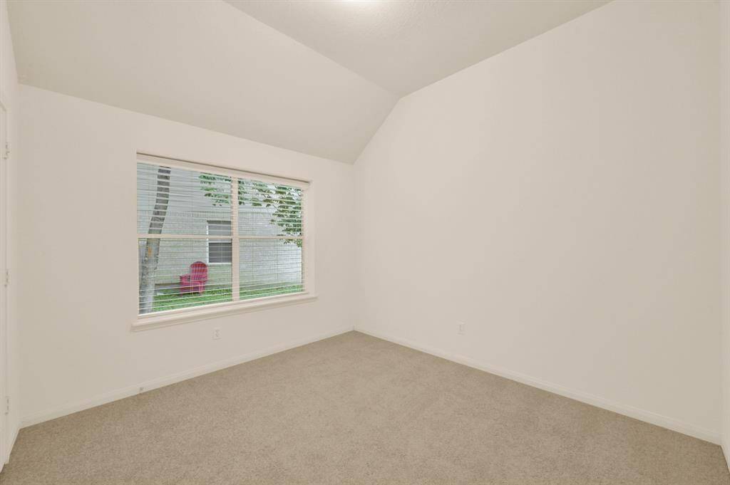 Secondary bedroom #1. New carpet in all bedrooms 2025.